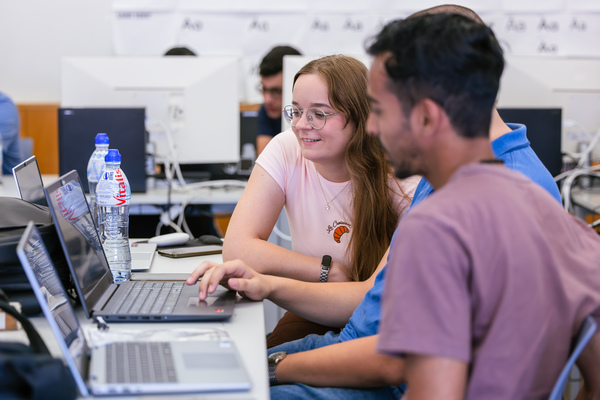 Students working together at computers
