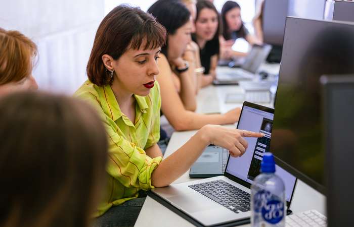 Students working together at computers