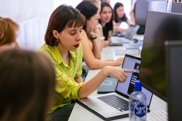 Students working together at computers